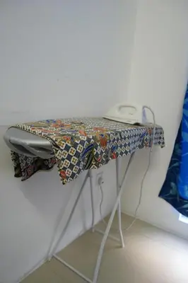 a table in a room with a sewing machine on it at Tropical Dream CH night market in Cameron Highlands