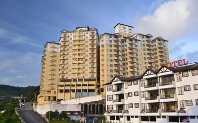 a large apartment building with two tall buildings at SA Apartments @ Crown Imperial Court in Cameron Highlands