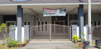 a building with a gate and a sign on it at Fahaz Kamunting Taiping in Taiping