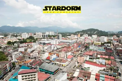 an aerial view of a city with buildings at Ipoh City Center Stardorm Ipoh Homestay in Ipoh