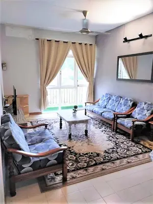 a living room with two couches and a table at 5-MINS WALK TO BEACH WITH POOL, Batu Ferringhi in Batu Ferringhi