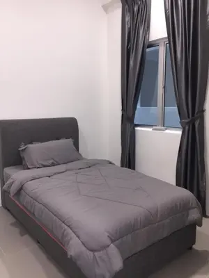 a bed in a room with a window with curtains at Cameron 2Room Square @Golden Hill in Cameron Highlands