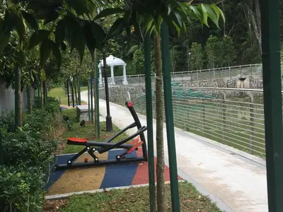 a treadmill in a park next to some trees at Cameron 2Room Square @Golden Hill in Cameron Highlands
