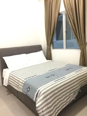 a bed in a room with a window at Cameron 2Room Square @Golden Hill in Cameron Highlands