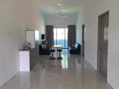 a living room with a table and chairs at Walking Distance To The Beach, Pangkor in Pangkor