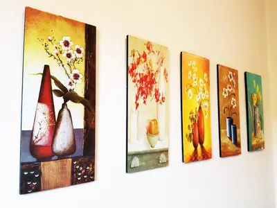 a row of pictures of vases on a wall at Lodge 163 Ventures in Ipoh