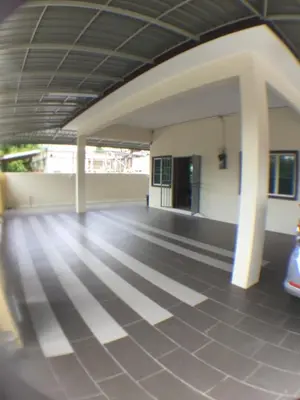 an empty hallway of a building with a parking lot at 1248 Cozy Home in Ipoh