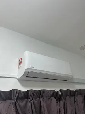 a white printer sitting on top of a ceiling at Eira Homestay Lost World Of Tambun M uslim only in Ipoh