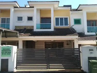 a house with a gate in front of it at Zahara Homestay in Cameron Highlands