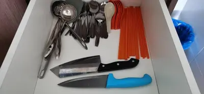 a drawer with a knife and other kitchen utensils at My Home Apartment @ Golden Hills in Cameron Highlands