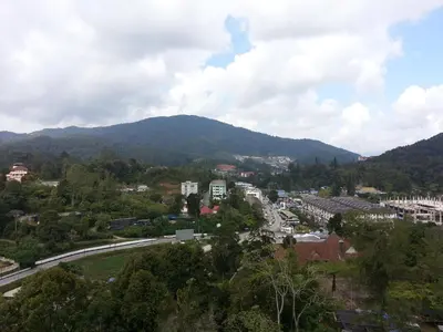 a view of a city with a mountain in the background at Heritage Hotel Cameron Highlands in Cameron Highlands