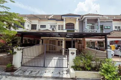 a house with a gate in front of it at GLYSM Tambun Stay in Ipoh