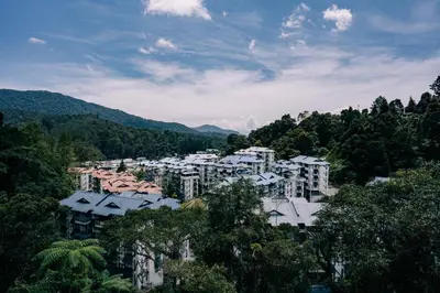 a view of a city with trees and buildings at Hotel De' La Ferns, Cameron Highlands in Cameron Highlands