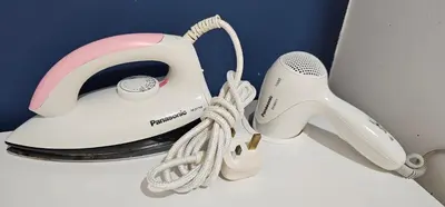 a white and pink toaster sitting on a counter at Mansion One by Hejmo Suites in George Town