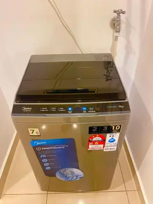a fax machine is on display in a store at Mansion One by Hejmo Suites in George Town