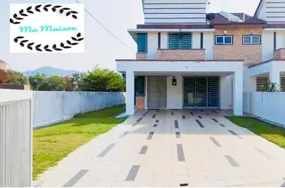 a large house with a driveway in front of it at Sri Manjung Ma Maison Homestay in Lumut