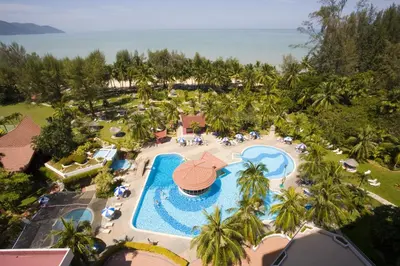 an aerial view of a resort with a swimming pool at The Bayview Beach Resort in Batu Ferringhi