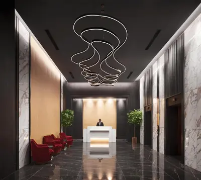 a lobby with a white table and red chairs at G Hotel Gurney in George Town