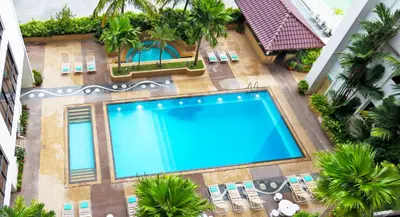 an overhead view of a swimming pool at a hotel at Bayview Hotel Georgetown Penang in George Town