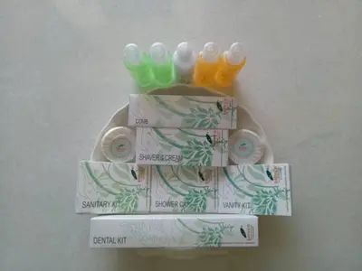 a group of different colored toothbrushes on a plate at Bayview Hotel Georgetown Penang in George Town