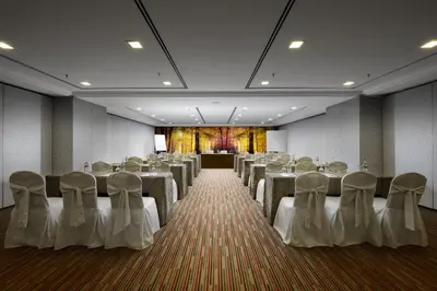 a room with rows of tables and chairs in it at Sunway Hotel Georgetown Penang in George Town