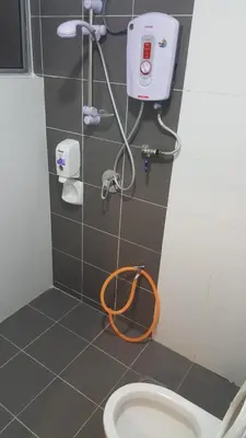 a bathroom with a shower with a toilet in it at My 2Rooms Apartments @ Golden Hills Pasar Malam in Cameron Highlands