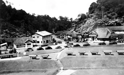 a black and white photo of a town with cars at FH Comfy Home in Bukit Fraser