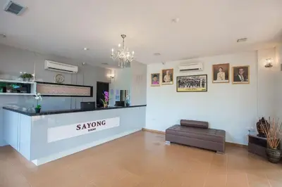 a waiting room with a sanyong sign on a counter at Sayong Resort in Kuala Kangsar