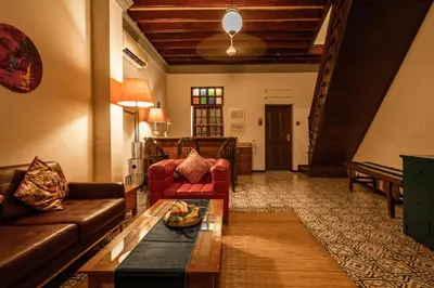 a living room with a couch and a table at Hotel Penaga in George Town