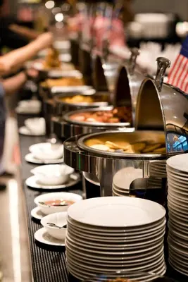 a line of plates and dishes on a buffet line at Avillion Cameron Highlands in Cameron Highlands