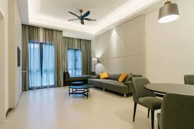 a living room with a couch and a table at Avillion Cameron Highlands in Cameron Highlands