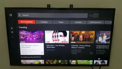 a television screen with several movies on it at The Octagon Ipoh - Home Stay in Ipoh
