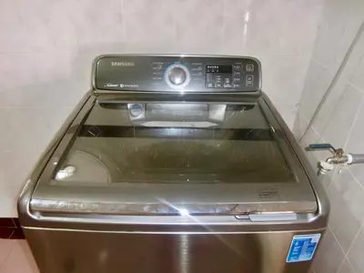 a stove top oven sitting on top of a appliance at Shuang Yang Sekinchan Homestay 7 in Sekincan