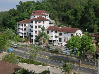 a view of a street with houses and a road at Lumut Titi Panjang Apartment in Lumut