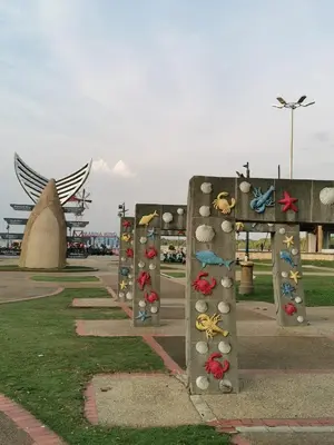 a monument with many stuffed animals on it in a park at Lumut Titi Panjang Apartment in Lumut