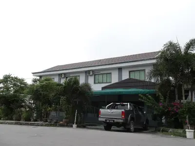 a truck parked in front of a building at Buntong Homestay -Rooms Only in Ipoh