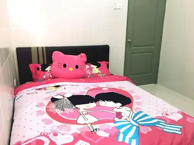 a pink hello kitty bed with a hello kitty blanket at W9 atGoldenHills NightMarket WiFi 4R BBQ in Cameron Highlands