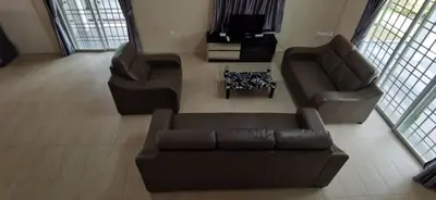 a living room with a couch and two chairs at My Home N2 @ Golden Hills Night Market in Cameron Highlands