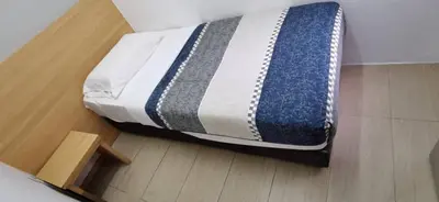 a bed sitting on the floor in a room at My Home N2 @ Golden Hills Night Market in Cameron Highlands
