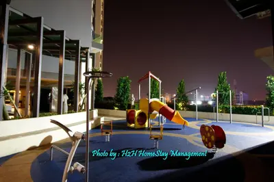 a playground in a building at night with at H2H - London House @ Majestic Ipoh (8~10 Guests) in Ipoh