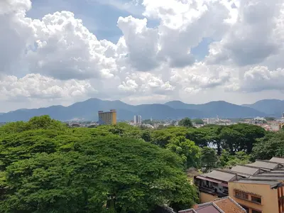 a view of a city with mountains and trees at Nordiska @ Majestic Ipoh in Ipoh