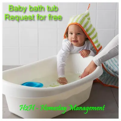 a baby sitting in a bath tub with a hat at H2H - Reunion House @ Majestic Ipoh \u5bb6\u597d\u6708\u5706 in Ipoh