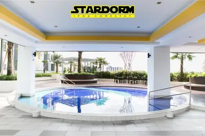 a large pool in a building with a sign that reads platform hospitality at Ipoh City Center Stardorm 2 Ipoh Homestay in Ipoh