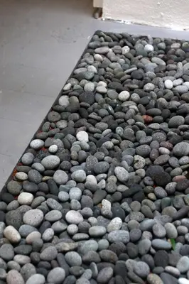 a bunch of rocks on the ground at Stay SongSong Beach Street in George Town