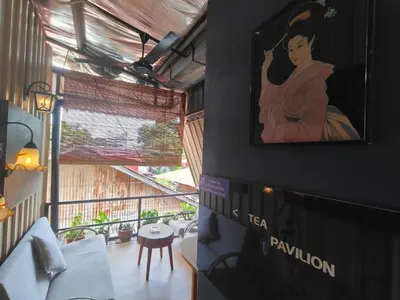 a room with a picture of a woman on the wall at SECRET STUDIO On Factory in George Town