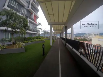 a walkway in the middle of a building with a roof at Le Maison GuestHouse Ipoh @ Octagon in Ipoh