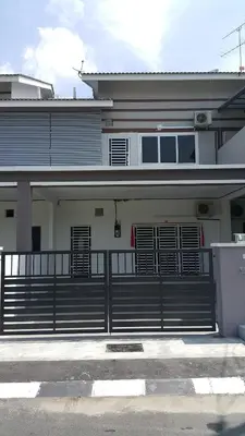 a building with a fence in front of it at My STW Home 2 in Sitiawan