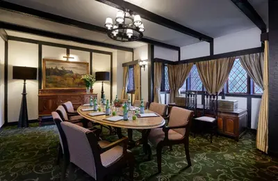 a dining room with a table and chairs at The Lakehouse Cameron Highlands in Ringlet