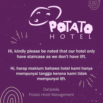a poster for a hotel with a picture of a dolphin at Potato Hotel in Taiping