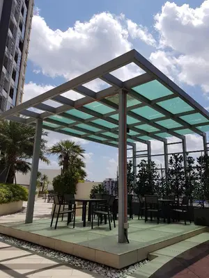 a pavilion with tables and chairs on a patio at Mike's Place @ The Majestic Ipoh in Ipoh